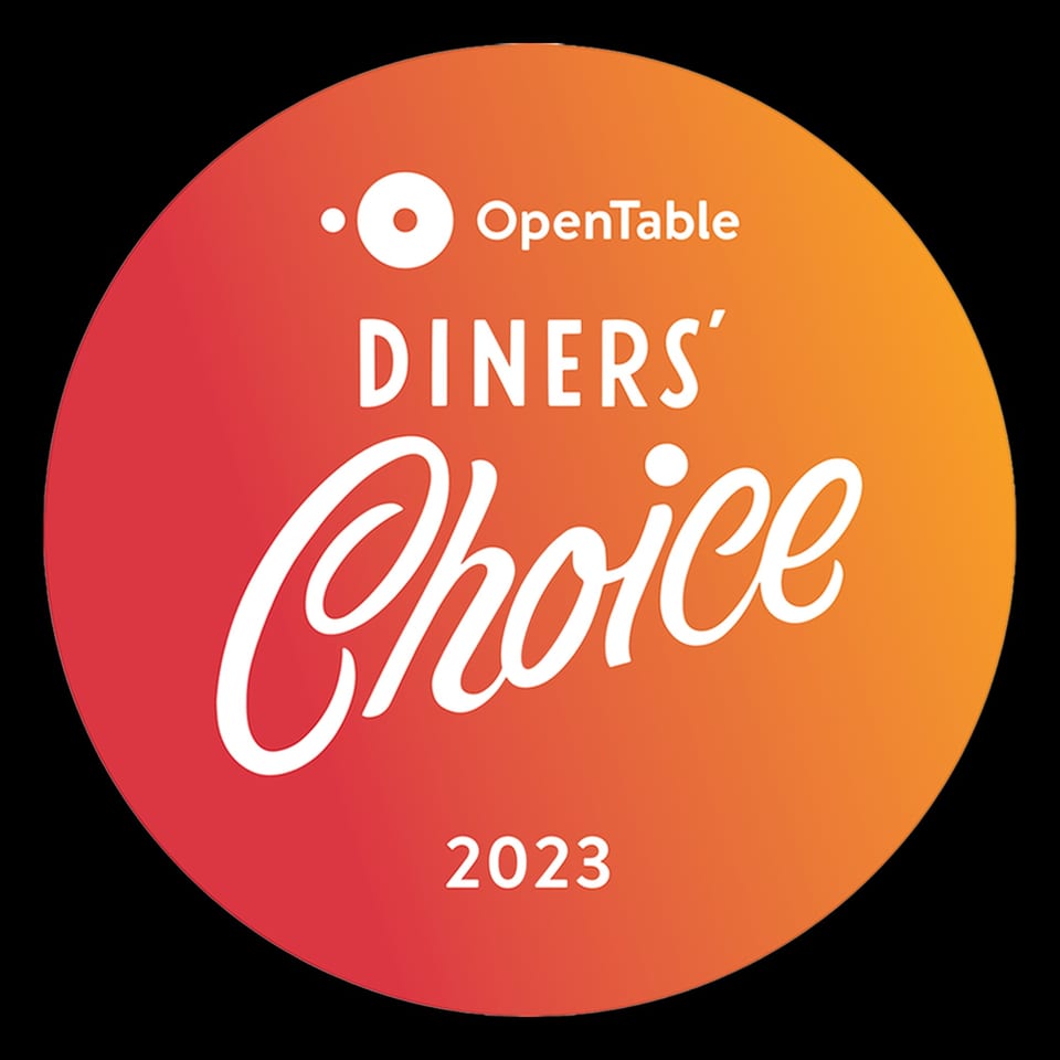 OpenTable Diners' Choice 2023 award logo, a red and orange gradient circle with white text.