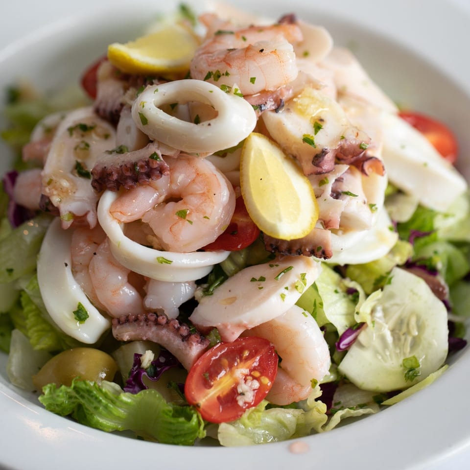 Rosario's Trattoria & Pizzeria's seafood salad with shrimp, calamari, octopus, and lemon.